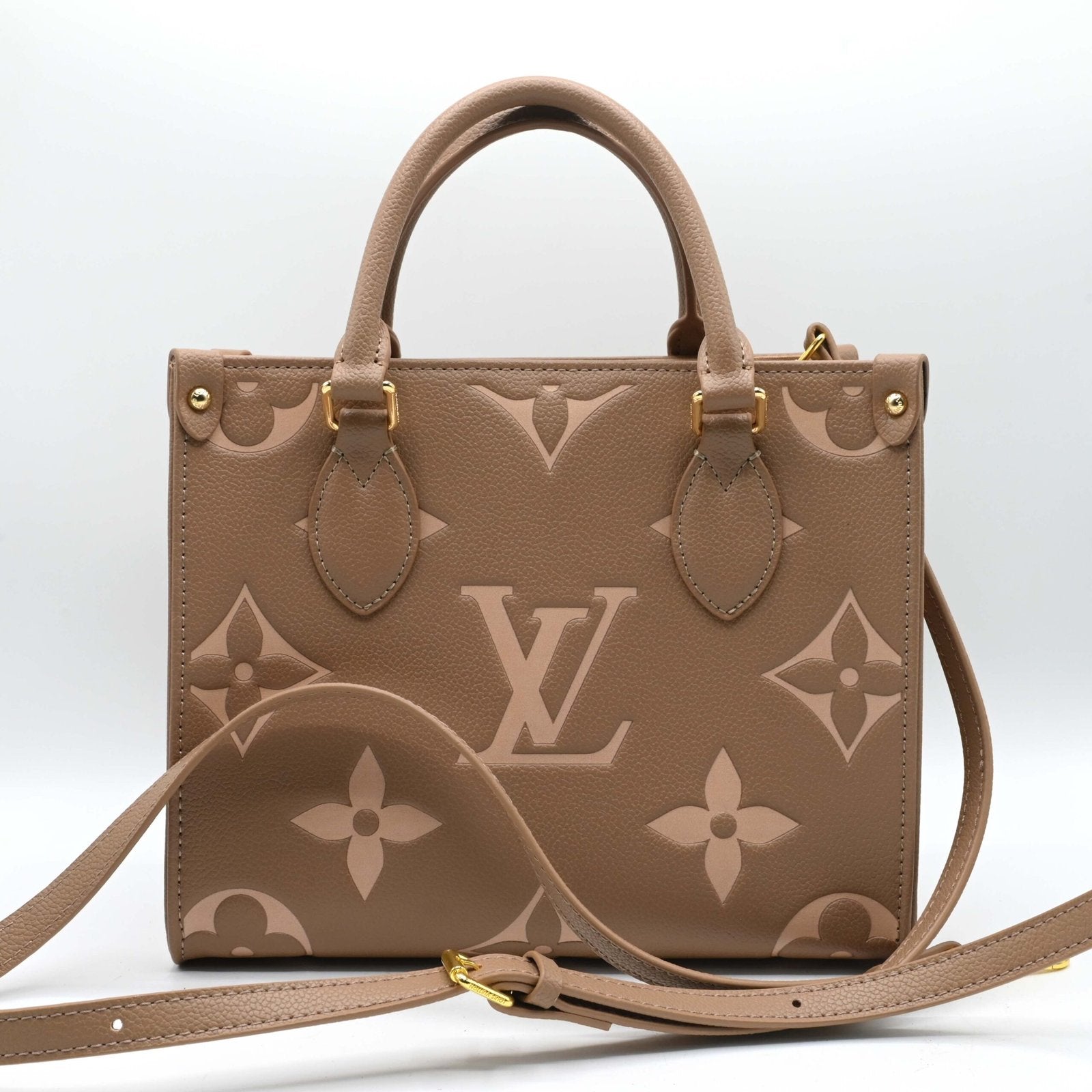 Louis Vuitton on the go Hand bag Brown (2)