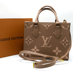 Louis Vuitton on the go Hand bag Brown